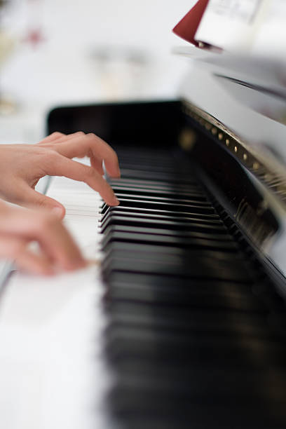 istock Girls hand playing piano 92400832