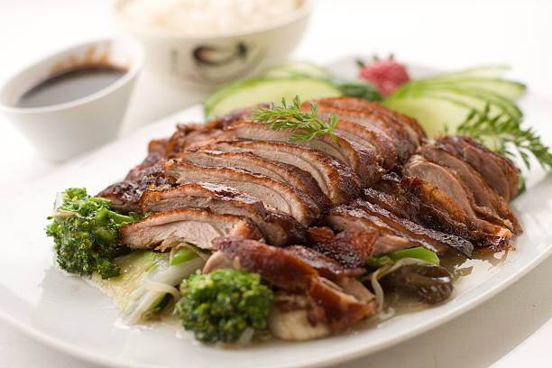 crispy grilled duck on mixed vegetables  hoisin sauce stock pictures, royalty-free photos & images