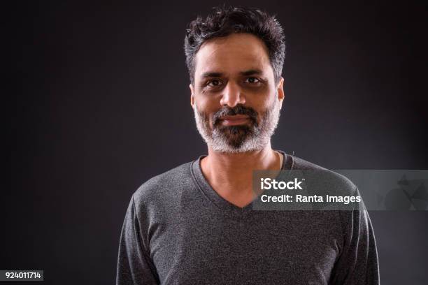 Portrait Of Indian Man Stock Photo - Download Image Now - Portrait, Black Background, Men