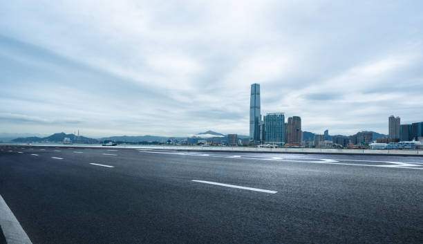 istock empty road travel through Hong Kong central 924012452