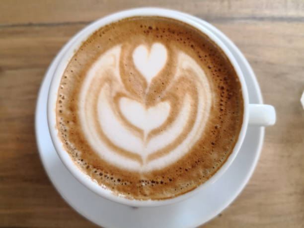 istock Cappuccino on a wooden table 924019322