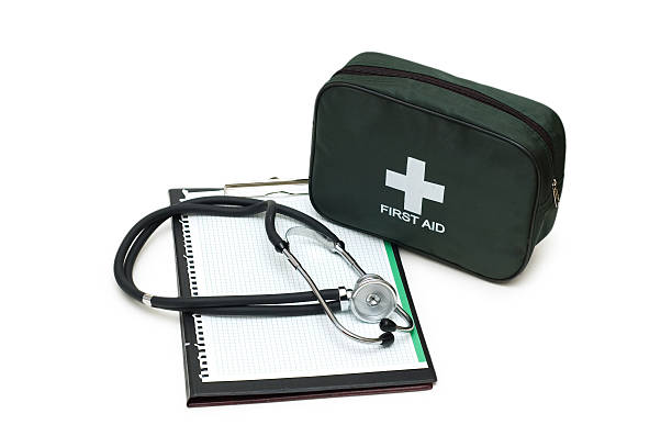 istock First aid kit, stethoscope and pad isolated on white 92402251