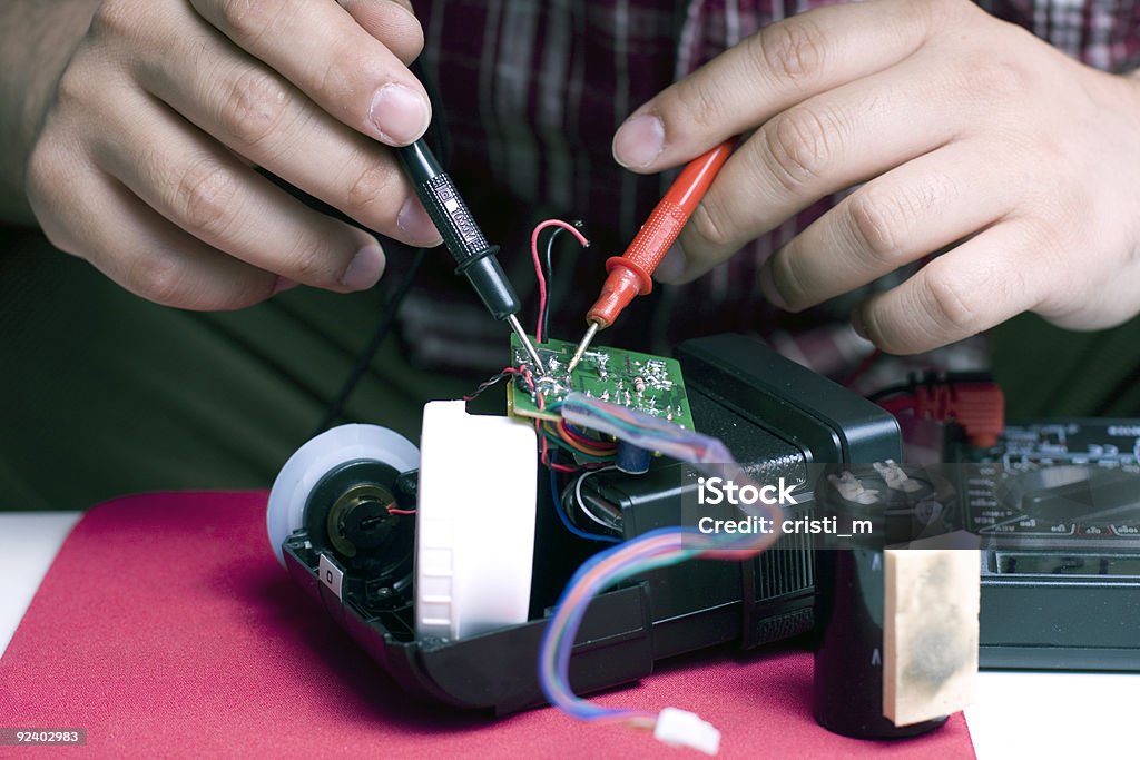 engineer repairing a flash unit  Black Color Stock Photo