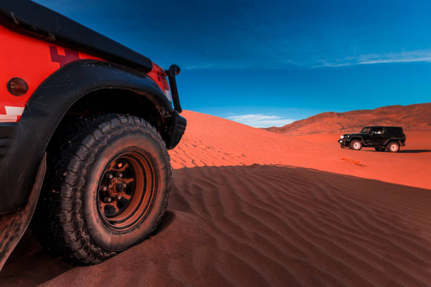 istock 4x4 vehicles and dunes 924030686