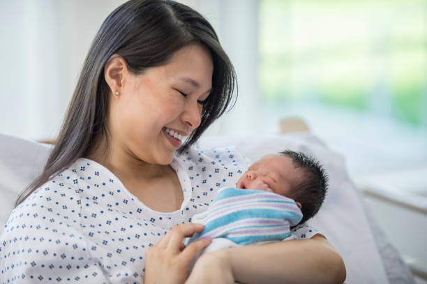 istock Mother Watching Over Her Baby 924030764