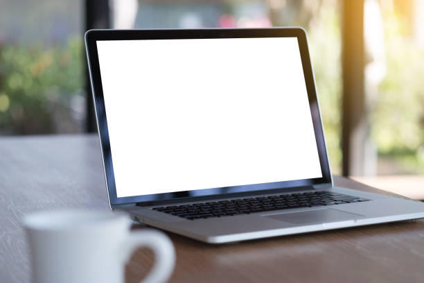 istock Laptop with blank screen on table. Workspace background new project on laptop computer with blank copy space screen for your advertising text message 924031368
