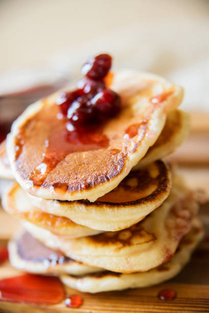 istock Blueberry pancakes on a contrasting black background. Close up 924034736