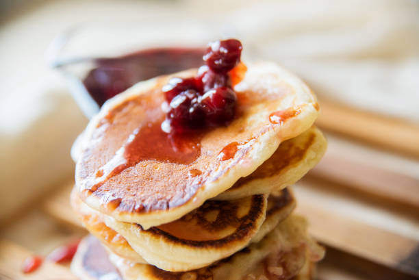istock Blueberry pancakes on a contrasting black background. Close up 924034738