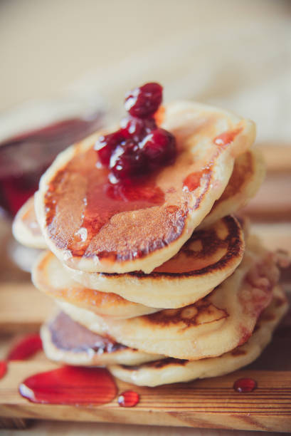 istock Blueberry pancakes on a contrasting black background. Close up 924034748