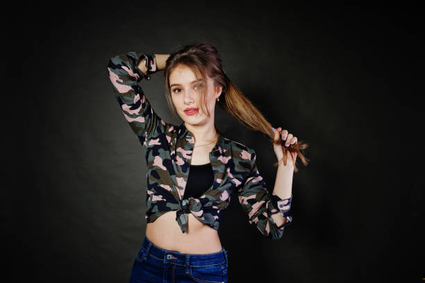 istock Handsome brunette girl posing at studio 924034804