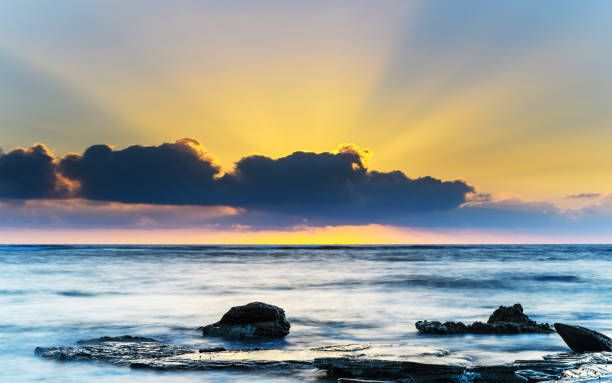 istock Rocky Sunrise Seascape 924038190