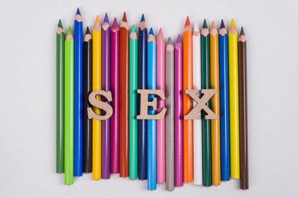 word sex abstrakcyjne litery, białe tło kolorowe ołówki - single object sensuality education isolated zdjęcia i obrazy z banku zdjęć