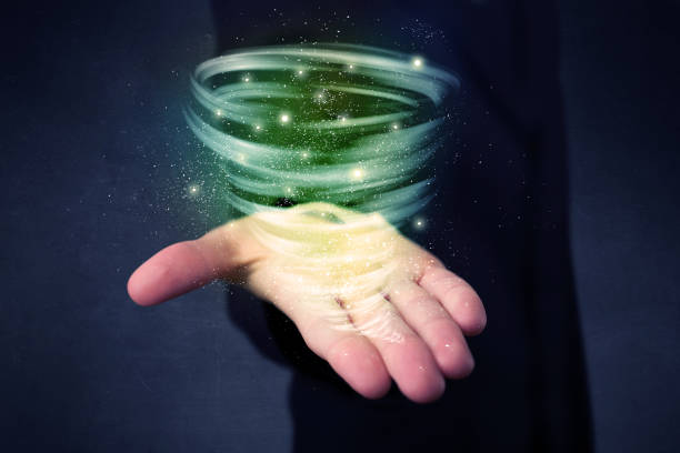 istock Businessman holding green tornado 924045944