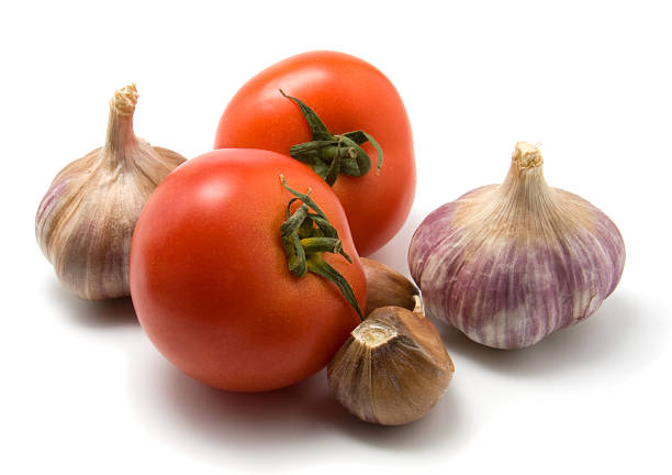 istock tomato and garlic isolated on white 92404884