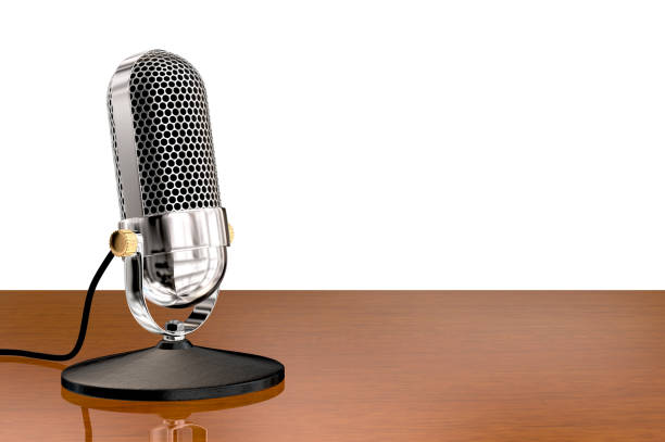 istock Chrome vintage microphone on table top stand 924055188