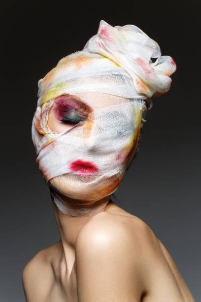 istock girl with heavy makeup and bandage on head 924058502