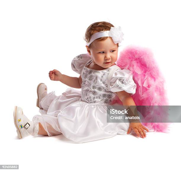 Little Angelic Girl In White Isolated Stock Photo - Download Image Now - Angel, Beautiful People, Bending Over Backwards