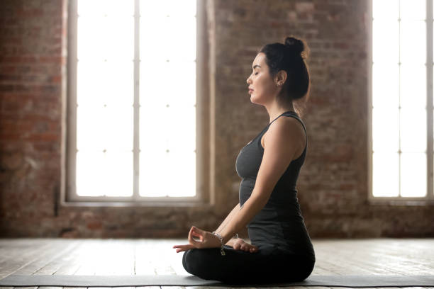 istock Young woman doing Padmasana exercise 924059504