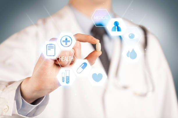 istock A doctor in white holding a pill 924062488