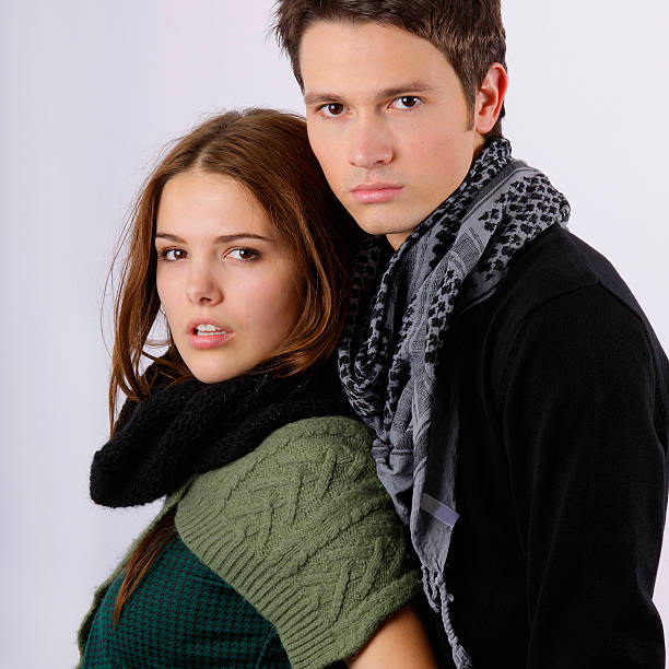 istock fashion models looking at camera as couple 92406348