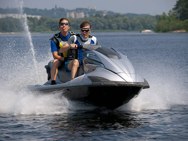 istock Couple men on jet ski in the river 92406753