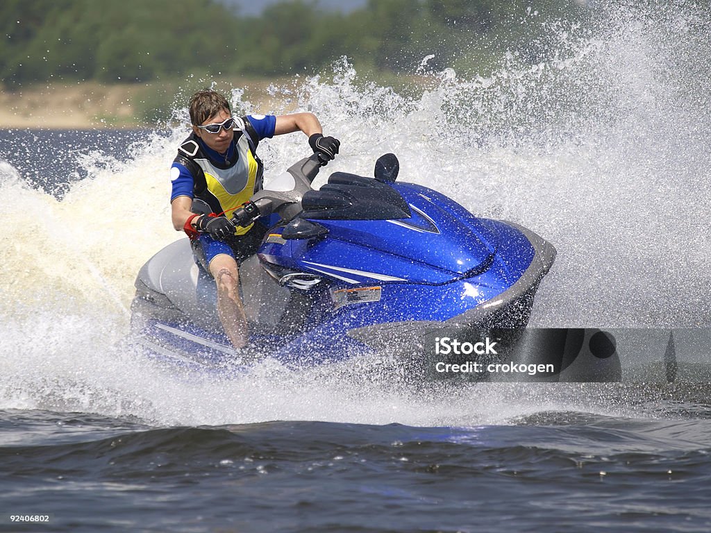 Mann auf Wave Runner macht schnell - Lizenzfrei Aktivitäten und Sport Stock-Foto