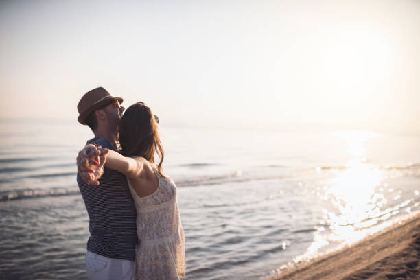 istock Love Couple Embracing by the Sea 924070016