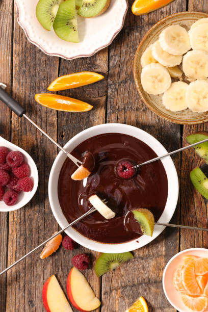 istock chocolate fondue with fruits 924072948