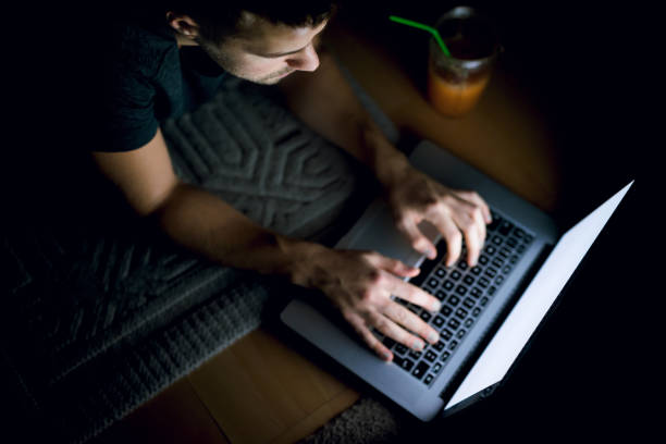istock Top view of man typing messages on laptop keyboard 924075878