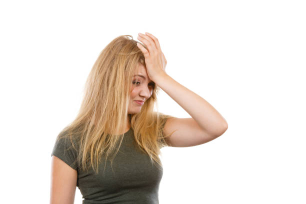 istock Ashamed embarrassed blonde woman with hand on face 924080042