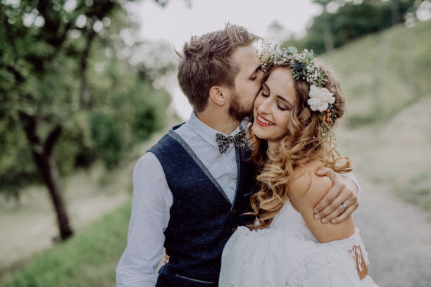 istock Beautiful bride and groom in green nature. 924080744