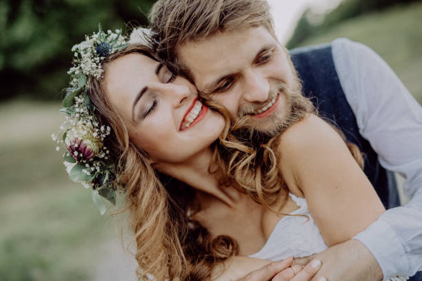 istock Beautiful bride and groom in green nature. 924081042