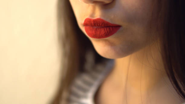 istock Young beautiful female applying her make-up 924083218