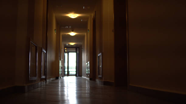 istock POV Smooth Wide Angle Shot Through Residential Hallway Corridor 924083468