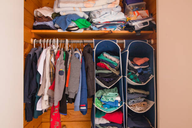 istock Clothing rack in kids room. 924087902