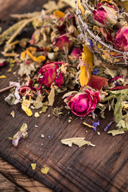 istock herbal tea with dry roses on wooden vintage table 924091350