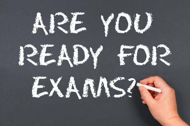istock Hand writing chalk on a blackboard text: Are You Ready For Exam 924091628