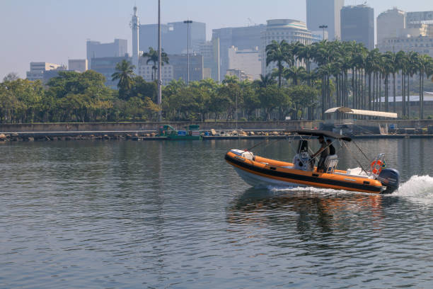 Fishermen in a speedboat in Guanabara Bay, Rio de Janeiro