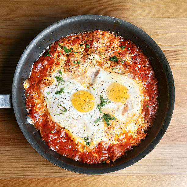 istock Two egg breakfast made Italian style in marinara sauce 92409406
