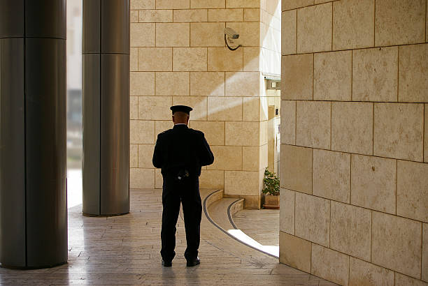 Interior view of a building with a security guard stock photo