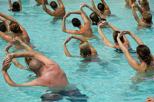 ウォータースポーツ - swimming exercising women back ストックフォトと画像