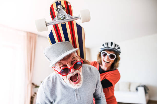 Senior couple having fun at home.
