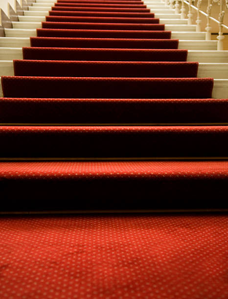 istock Red carpeted grand staircase entry 92410187