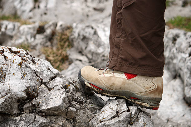 istock Closeup of Hiking Boot on rock 92410373