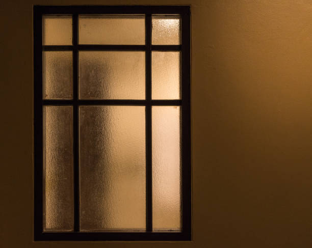 istock Ground glass window on yellow wall 924104220
