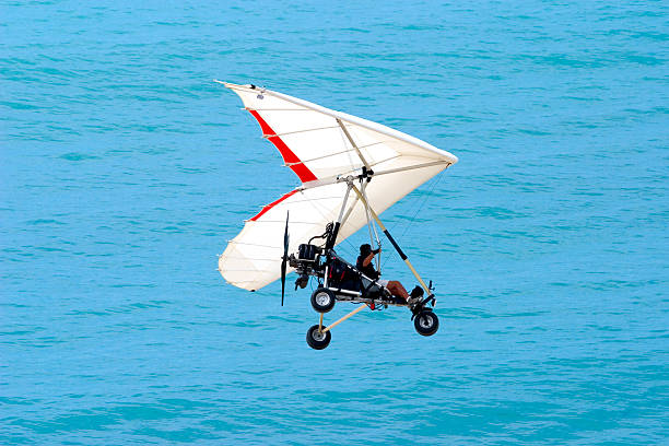 istock Ultralight Flying over the Ocean 92410715