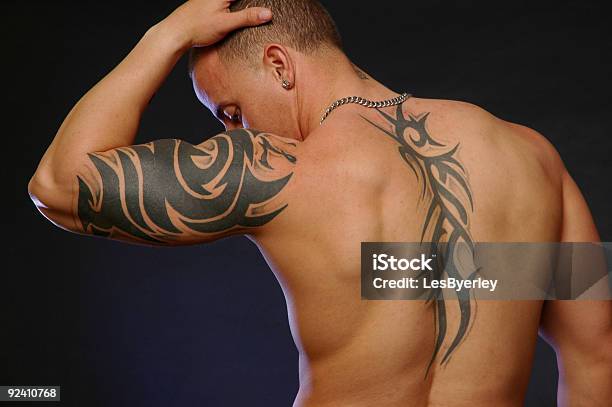 Male With Tribal Tattoos Stock Photo - Download Image Now - Tattoo, Indigenous Culture, Back