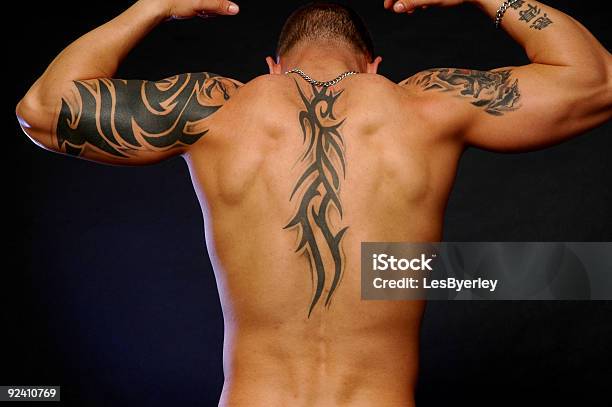 Mans Back Showing Tribal Tattoos On Arms And Back Stock Photo - Download  Image Now - Tattoo, Back, Indigenous Culture - iStock