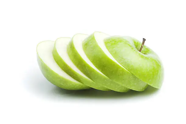 A sliced apple on a white background.