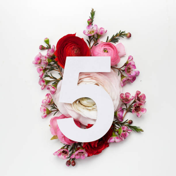 istock Layout with colorful flowers, leaves and number five. Flat lay. Top view. 924111128
